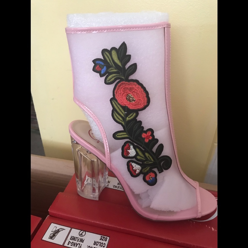 Ladies pink peep toe translucent heels with design
